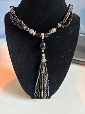 Vintage Silvertone metal, black & brass beads w/ tassel, lobster claw clasp Boho